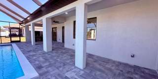 Brand-New Waterfront Luxury in Cape Coral | Heated Pool, Spa, Outdoor Kitchen & 3-Car Garage Gallery 39