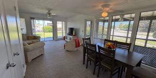 FULLY FURNISHED 2-Story Townhouse on Canal – Pool, Golf Views & ALL Utilities Included! Gallery 1
