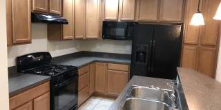 2 Level Townhouse/condo with one car garage in the Watkins Mill Town Center Gallery 5