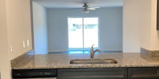 Like New 3/2/2 house with a screened in porch. Gallery 8