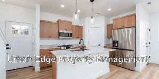 Row Home with 2 car garage, 3 bed, 2.5 bath Gallery 1