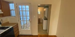 A charming two bedroom one and one half  bath row house located just off New Jersey Ave in the Shaw Neighborhood! Gallery 6