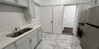 Stylish 2-Bedroom Unit Featuring Decorative Fireplace Gallery 6