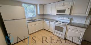 True 3 Bed~2 Bath~with garage. Over 1,000 sq ft, with updated kitchen & bathrooms, large open living space & a fenced in yard!! Gallery 7