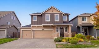 Spacious 5-Bedroom Puyallup Home with Bonus Room & Fully Fenced Yard! Gallery 1