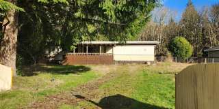 2 Bed 1 Bath single wide mobile home on just shy of 1/2 acer lot in Lake Stevens $2350.00/mo Gallery 1