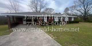 Beautiful cozy 4-side brick ranch home with just over an acre of land! Gallery 1