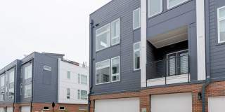 Stunning South End end unit townhome in the modern and amazing Southpoint community. Gallery 44