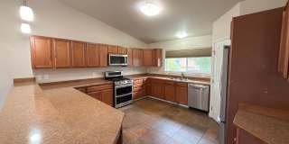 Stunning and spacious 4-bedroom, 3-bathroom Home in Sand Lake! Gallery 1