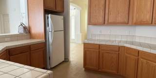 Beautiful 3 bed home with 3 car garage in Indian Hills behind Target Gallery 18