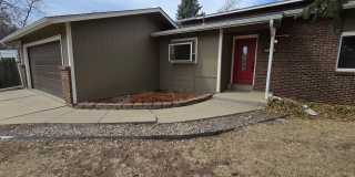 Charming Tri-Level 4-Bedroom on Corner Lot just steps to Waneka Lake  Coal Creek Trail Gallery 1