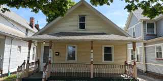Charming West Side Home with Covered Porch & First-Floor Laundry Gallery 1