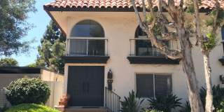 Beautiful Townhome with large fenced back patio, second story balcony, and two covered parking spots Gallery 1