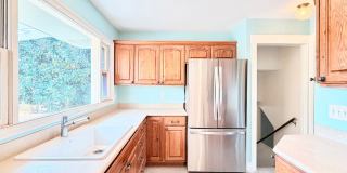 Charming Updated 1950s Home with Refinished Hardwoods & Large Fenced Yard – Landscaping Included! Gallery 4