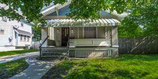 Charming 3BR Home with Classic Woodwork, Porch  Bonus Attic Space Gallery 1