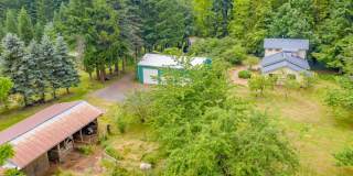 PRIVATE HOMESTEAD WITH ACREAGE & SHOP Gallery 1