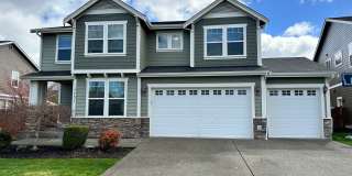 7731 McKinley St NE_A/C + 3/4-car garage Gallery 1