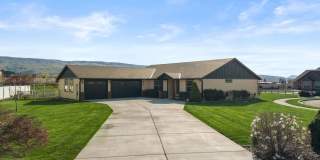 Located in Sunnyslope! 3+ beds, 2.5 baths, 3 car garage with open living spaces and huge yard! Gallery 1
