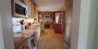 Beautiful 4-bedroom, 2-bathroom Spacious home! Original hard wood floors throughout! Gallery 10