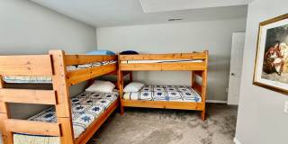 Furnished and Utilities Included: Two-Bedroom Basement Apartment with Private Yard Gallery 11