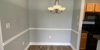 1/1 in the Heart of Brandon with a lake view! Gallery 6