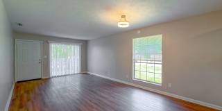 RENOVATED 2/1 w/ New Flooring/Paint, Fenced Yard, Deck, Walk In Closets, Granite Counters, & Stainless Appliances ! Avail NOW for $1295/month Gallery 8