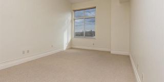 Gorgeous two bedroom two bath with 1574 ft. Two parking spaces included balcony, beautiful rooftop deck no pets. Gallery 9