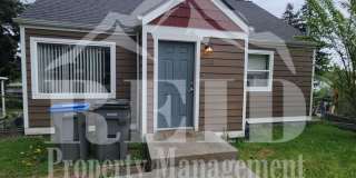 Centrally Located Bremerton Home With Partial View of Sinclair Inlet from Deck Gallery 1
