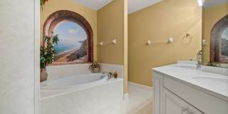 Experience Bell Tower Park. GATED ground floor 2 Bed 2 Bath Den 1 Car Garage Condo. Gallery 18