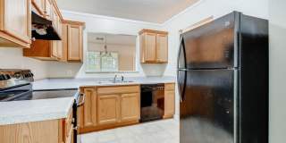 Newer Ranch Style Home w/Fireplace, Trey Ceilings and Black Appliances - Total Electric Gallery 16