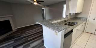 3/2 Regency Gardens 1st Floor Condo with New Plank Fooring, Stainless Appliances, and Fresh Paint! Gallery 12