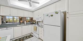 first-floor unit featuring a 2 bedroom, 2 bath fully furnished Gallery 6