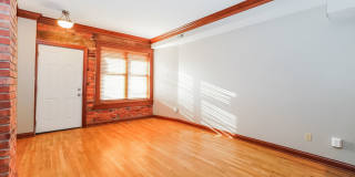 Charming 1-Bedroom Apartment with Exposed Brick, Hardwood Floors & Updated Kitchen Gallery 11