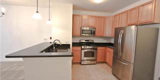 Modern 1 Bed Condo at The Grande | Garage Parking + Resort Amenities | Walk to Fayette St Gallery 1