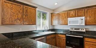 June Rent Free!!  Move Today!  Four Bedroom, Three Bath Home with Beautiful Backyard, Two Car Garage, New Appliances and More!  Short Term Lease Available!! Gallery 14