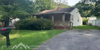 Charming 2-Bedroom Home with Bonus Sunroom, Covered Patio & Fenced Backyard Gallery 1