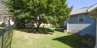 3-Bedroom NE Rochester home with Sunroom, Fenced Backyard & Attached Garage Gallery 5