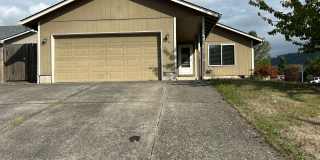 Three Bedroom Home with an Attached Garage Gallery 1