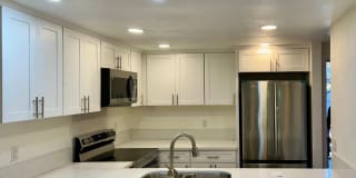 Beautiful finishes, MUST SEE! Renovated 1 bedroom condo in La Jolla Park Villas! Includes 1 COVERED PARKING SPACE! IN UNIT WASHER  DRYER! Plenty of storage space! Gallery 1