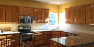 {7301} Quiet Cul-de-sac + Three Car Garage + Updated Kitchen + Finished Basement + Bedroom Level Laundry Gallery 7