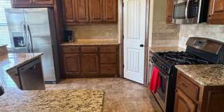Fully Furnished Three Bedroom, Two Bathroom in the Enclave!!! Gallery 13