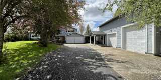 Comfortable Living in Bethany with Two Separate Units, Expansive 0.45-Acre Lot & Versatile Detached Shop Gallery 1