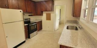 Charming 3BD/1BA located within walking distance to Friendly/College Hill neighborhood Market of Choice! Gallery 9