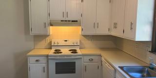 Updated 2 bedroom, 1 bath apartment with walk-out patio off of kitchen, and updated flooring. Gallery 3