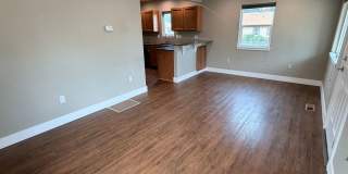 Spacious 2 bed/1 bath home! Fenced yard, a/c, d/w, w/d, large garage and MORE!! Gallery 6