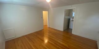 Private carport, in-unit laundry, and the Lakewood strip right outside your door. Gallery 3