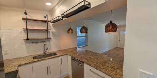 Stylish South Middle River Retreat with Tropical Backyard Gallery 9