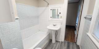 Fully fenced yard with stainless steel appliances including gas stove! Gallery 8