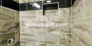 Lovely Three Bedroom Home in KCMO and an Updated Kitchen  w/ Granite and SS Appliances, including a Fenced Yard! Gallery 18