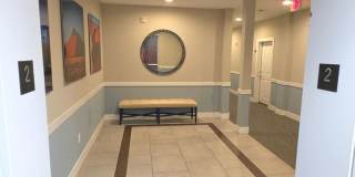 Beautiful 2nd floor (with elevator services) condominium: 2-bed, 2-bath, beautiful kitchen, bonus room, laundry room & deck! Gallery 4